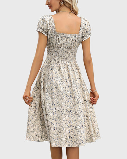 Aurore midi jurk met bloemenprint, puffmouwen en V-hals