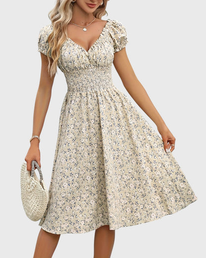 Aurore midi jurk met bloemenprint, puffmouwen en V-hals