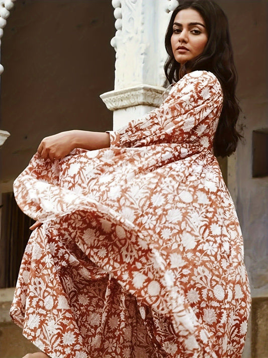 Élise midi jurk met bloemen en pofmouwen